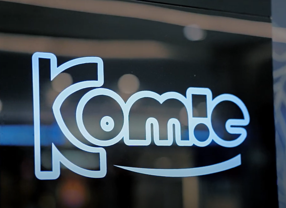 alt=KOMIC logo on it's pop-up store in Penang
